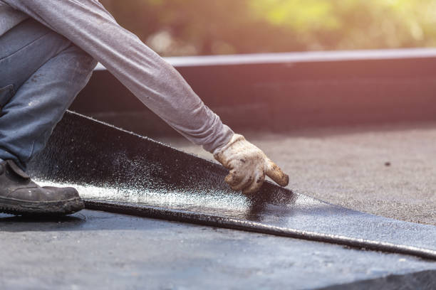 Professional Basement Waterproofing technician working in Waterport, NY